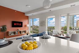 Top-Floor Condo with Skyline Views + Parking + Gym