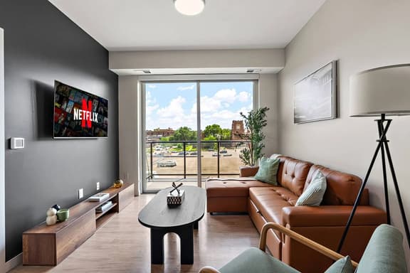 Chic Downtown Condo w/ Gym by Traveller's Comfort